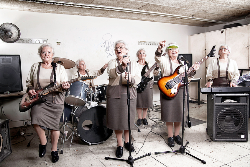 3rd generation rock band playing